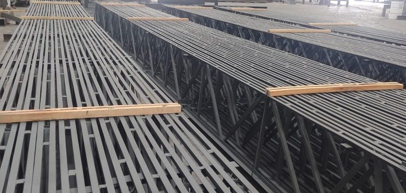 Fabricated steel members staged in the plant