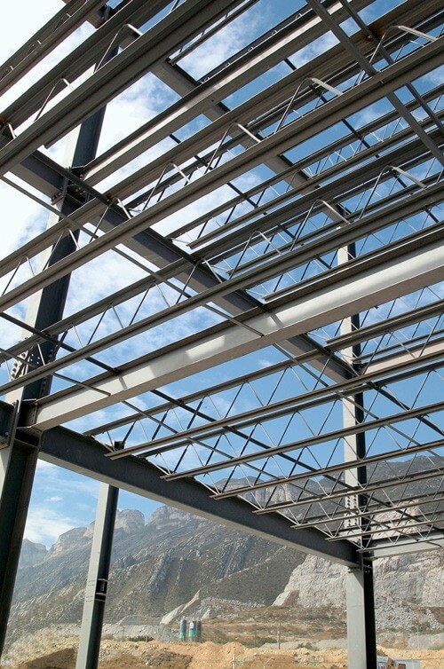 Installed steel joists viewed from beneath the roof framing